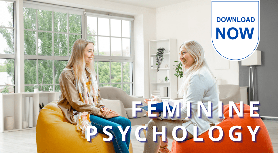 Woman psychologist with gray hair talking to woman patient with long blond hair sitting in a counselor's office